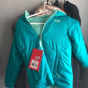 New w tags big kids medium north face jacket.
